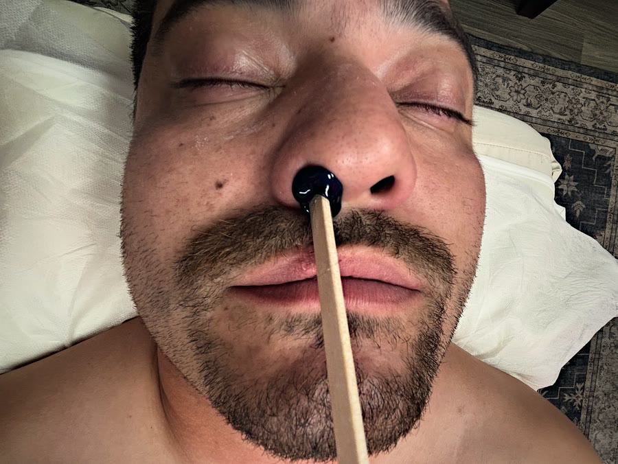 A nose wax in progress